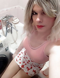 Sissy wearing A Large And Heavy Chastity Cage