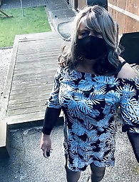 Kelly in fishnets and black boots