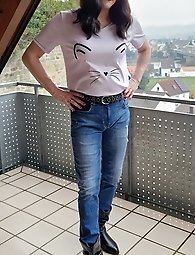 A flexible girl in men s clothes has fun with a cock