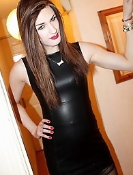 German shemale hooker is posing seminaked on camera