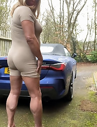 Kellycd2022, an amateur crossdresser, showcases her seductive MILF figure while urinating outdoors in a collection of 46 images on xHamster.