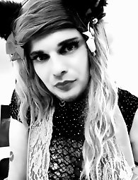 A cross-dressing individual enjoys using a blue-colored sex toy - consisting of 26 images on xHamster