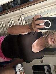 A slender transgender woman is pleasuring herself