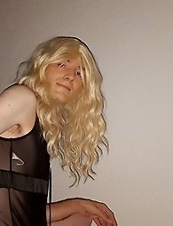 The enticing crossdresser, Kellycd2022, in a provocative hot pink attire